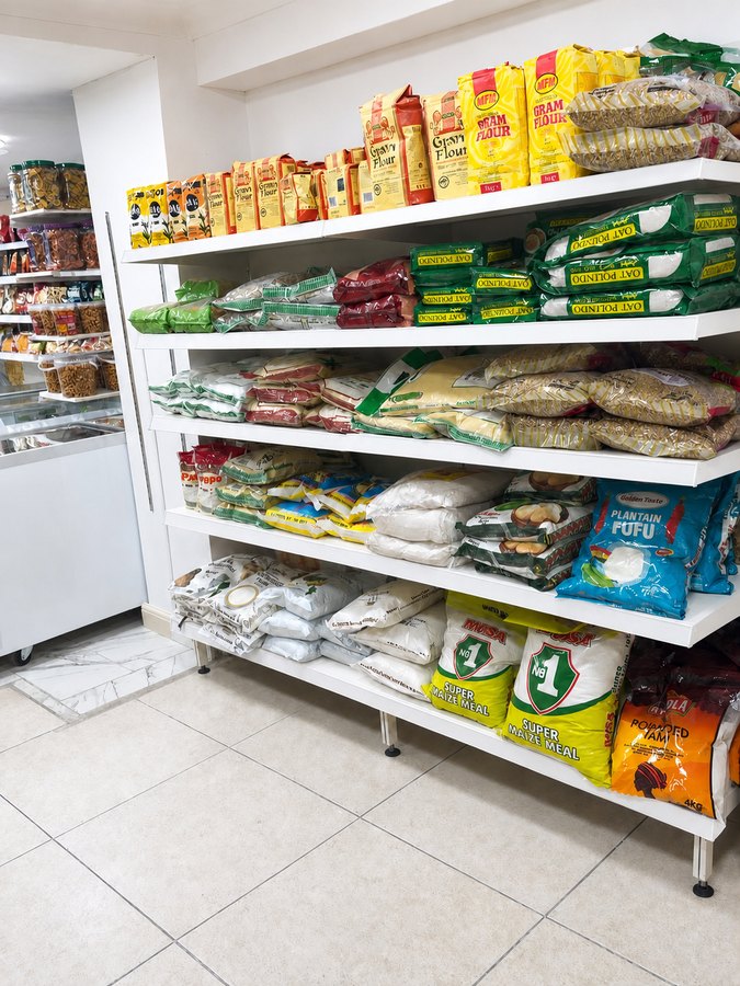 Shelves of plantain fufu, pounded yam, maize meal and gram flour